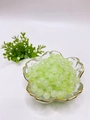 Detail of 8mm light green round glass beads in a gold-rimmed bowl for DIY jewelry making - 11# Light Green Glitter
