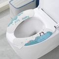 Waterproof EVA toilet seat pad with blue penguin print and hygienic lifting handle - Blue Penguin