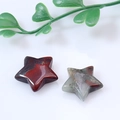 Polished natural bloodstone star ornaments with deep red and green speckled patterns - Bloodstone