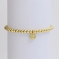 Detail of golden beaded bracelet featuring a round pendant with engraved letter E - Letter E (DB240603-E)