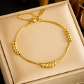 Double-layered gold stainless steel snake chain bracelet with sliding beads on silk - Gold Bead Bracelet (B1351 Gold)