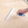 Blue and white non-slip window squeegee cleaning foam on a wooden surface - Model 073-1 / Blue