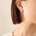 Silver Roman numeral double-loop earrings with crystal-inlaid inner ring on model - F297-Silver/Steel Earrings