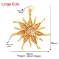 Golden sun pendant charm with white crystals measuring 32mm by 38mm for DIY jewelry - L249079-Gold Sun Starburst