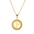 Detailed close-up of golden round pendant featuring letter P surrounded by sparkling rhinestones - Letter P