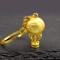 Golden trophy with football keychain accessory in a high-gloss metallic finish - Football Trophy Style (A-062)