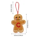 Brown gingerbread man felt ornament with red letter C and festive white stitching - Style C