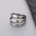 Macro shot of 316L stainless steel triple-layer ring with interior metal engraving - US 9 / Steel