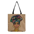 Close-up of durable canvas fabric texture and vibrant ethnic portrait print on tote bag - Afro Lady Portrait-Geometric Turban-Ethnic