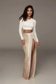 Detail van de champagne geplooide maxi-rok met hoge split en zijdezachte fluweeltextuur - S / Abrikoos