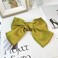 Elegant olive green satin bow hair clip with a smooth metallic sheen finish - Ginger Yellow (Duckbill Clip)