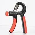 Adjustable 5kg to 60kg grip strengthener in black and orange with non-slip rubber handles - Plain Style / Black Red