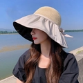 Beige wide brim sun hat with straw crown and bow detail against a scenic lake background - Beige with Ribbon