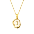 Lava shell necklace with gold plated 18K finish featuring a white pearl letter J pendant - Letter J