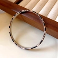 Vintage leopard print twisted leather bangle with elegant silver metallic inner lining - Silver Inner Brown Black Leopard Style