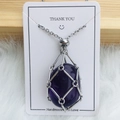 Silver metal cage necklace with oval dark purple crystal stone pendant on white card - Silver Amethyst