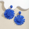 Handmade blue raffia flower earrings with woven daisy design for a beach resort style - Blue Sunflower Woven Earrings