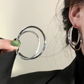 Fashionable double layer silver hoop earrings with sparkling cubic zirconia on a model - Round Silver Hoop (51#)