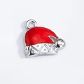 Detailed macro view of a Christmas hat alloy pendant with red and silver enamel finish - Christmas Hat