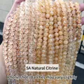 Strands of 5A natural citrine beads in champagne yellow with clear icy texture - 8mm approx 47pcs / 5A Natural Citrine