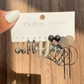 Set of 6 silver geometric earrings featuring pearls and black heart drops on a card - 49 White K (11301)