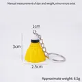 Llavero mini volante de bádminton de PVC amarillo, altura 3cm con anilla de metal plateado - Llavero / Amarillo