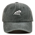 Close-up of white wave embroidery on a vintage washed dark grey cotton baseball cap - One Size / Green