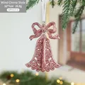 Pink glitter bell Christmas ornament with bow hanging on tree, 10x7cm size - Wind Chime Style