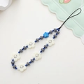 Detail of handcrafted beaded phone charm with white flowers and blue frosted beads - Flower Beaded Style (K1077)