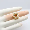 Macro view of gold flower charm with clear rhinestones for DIY bracelet accessories - 10MM Gold Rhinestone-Flower