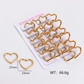 Detail showing gold heart-shaped stainless steel earrings with size 27mm by 23mm - Large Heart / Gold