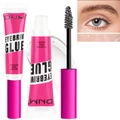 Detail of fiber eyebrow mascara with brush head and professional styling effect - Clear
