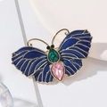 Vintage butterfly brooch with blue enamel wings and colorful crystal gemstones - Blue