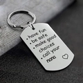 Silver Have Fun Be Safe Make Good Choices keychain with heart icon on textured fabric - Nana