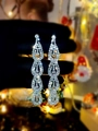 Elegant long silver tassel earrings with sparkling rhinestones in a tiered wave design - Silver Wave Tassel