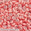 Flat round pink acrylic smiley face beads for DIY jewelry and handmade bracelets - Korean Pink Black Smile