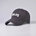 Close-up of deep gray cotton baseball cap featuring white TALES 3D embroidery detail - Gray