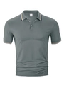 Close-up of grey polo shirt collar showing size M label and 100% polyester fabric texture - S / Tops / Gray