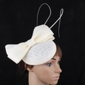 Elegant cream mesh fascinator hat featuring a large bow and feather accents for women - Off White