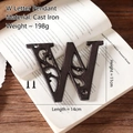 Industrial cast iron letter W wall decor with ornate pattern and mounting screws - Letter W