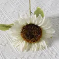 Single white artificial sunflower with pink petal tips on a woven fabric background - New Style Sunflower (White)