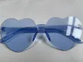 Blue rimless heart shaped sunglasses with transparent candy color jelly finish - Light Blue