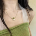 Elegant lily of the valley double layer necklace with green leaf pendant on gold chain - Lily of the Valley Style