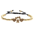 Adjustable woven bracelet with gold girl charm and zircon heart pendants on black string - Girl + Copper Beads Black Rope