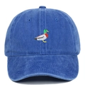 Close-up of a green duck embroidery on a washed blue vintage cotton baseball cap - Sapphire Blue