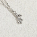 Polished silver bear pendant necklace with sparkling heart zircon and cross chain - Bear Zirconia / Platinum Color