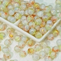 Macro detail of 10mm cracked glass beads with gold foil for DIY jewelry making - Green Kite (10mm Protein Jade)