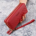 Long red embossed leather wallet for women with double zippers and wrist strap - Red