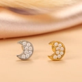 Close-up of gold and silver moon cartilage studs with shimmering zircon inlay detail - Pave Crescent Style (2#)