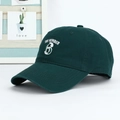 Close-up of deep green cotton baseball cap featuring white The Number 6 embroidery - One Size Adjustable / Green